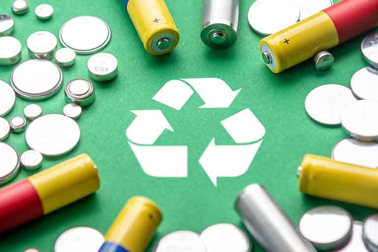 combination of button cell, AA, and D batteries in need of battery recycling service