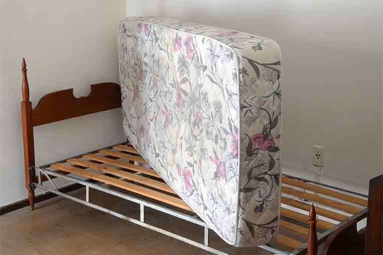 mattress and box spring removal service from Garbage Gurus