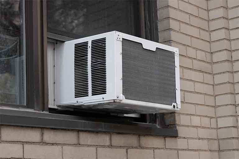 air conditioner disposal service - ac in window