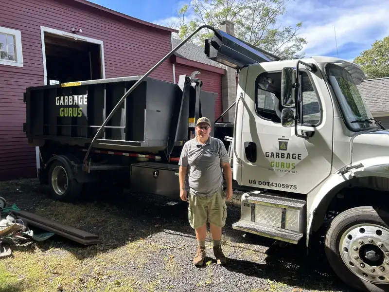Josh Caron, co-owner of Garbage Gurus at a Commercial Junk Removal job in Hubbardston, MA