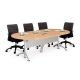 Meeting table with four ergonomic chairs, highlighting office furniture suitable for removal and disposal services by Garbage Gurus.